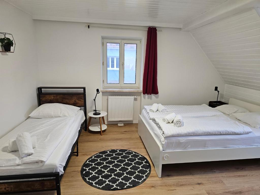 Postel nebo postele na pokoji v ubytování Aparthotel Horn Bahnstrasse