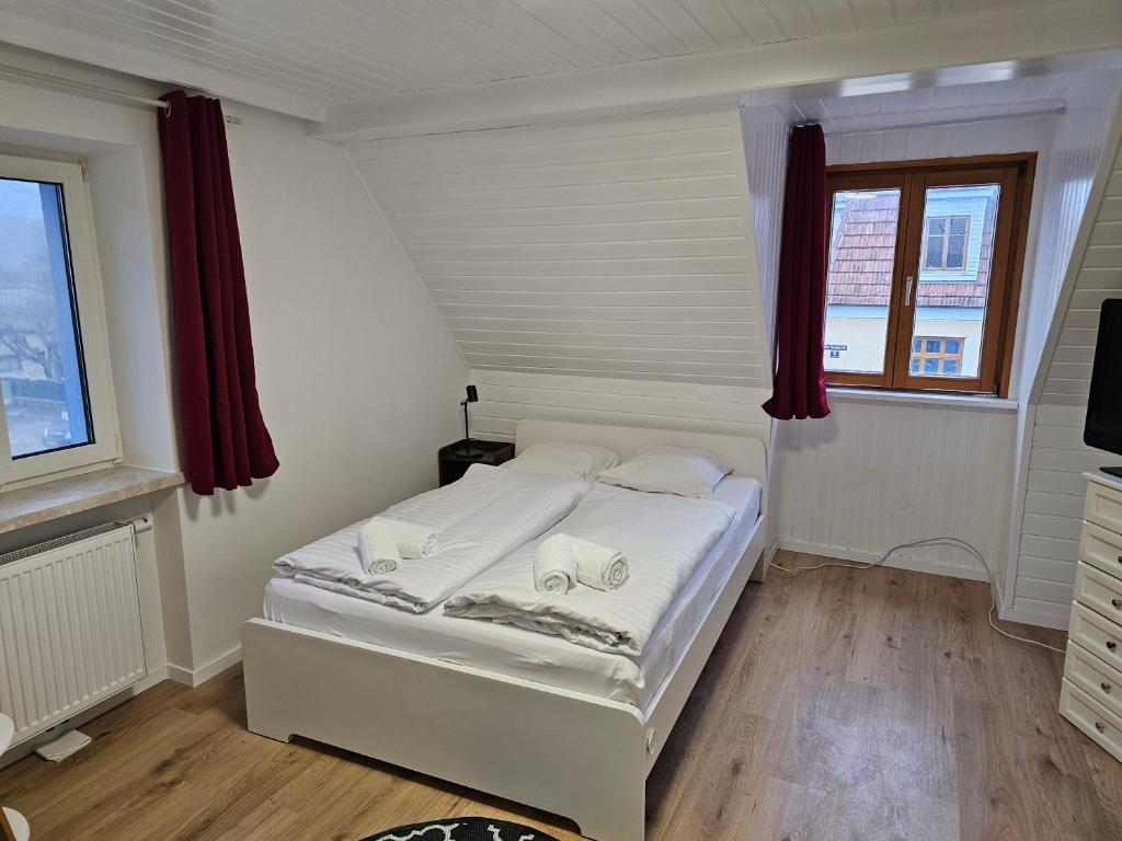 Postel nebo postele na pokoji v ubytování Aparthotel Horn Bahnstrasse