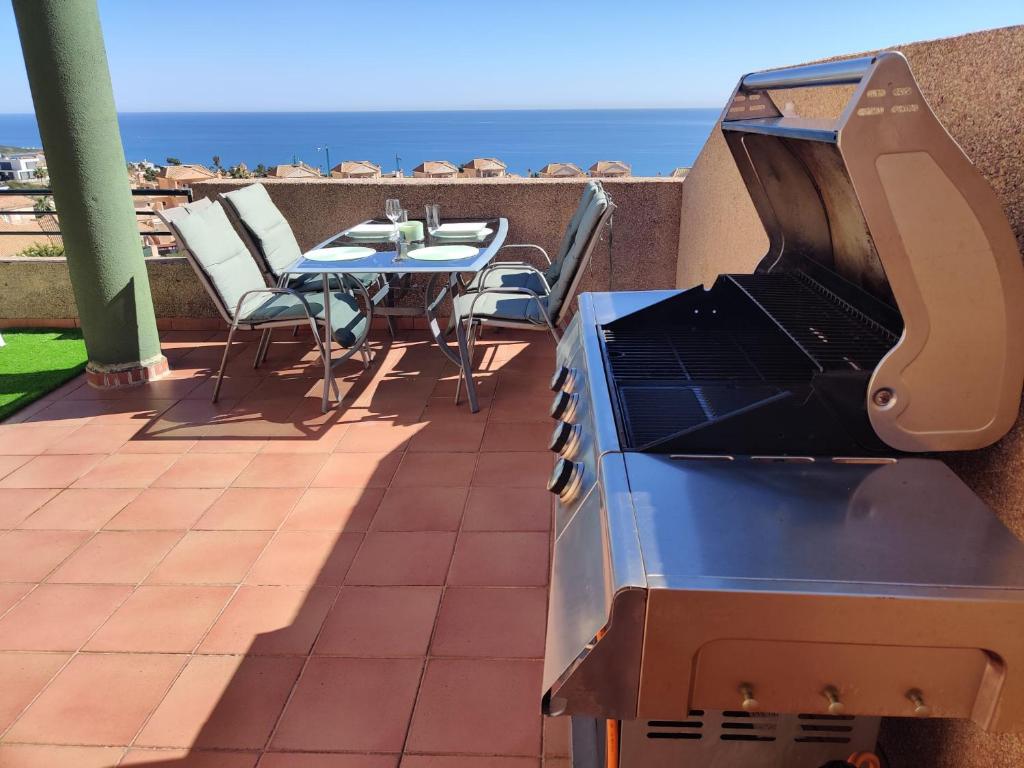 Balkón nebo terasa v ubytování Bohemian Penthouse in Alcaidesa