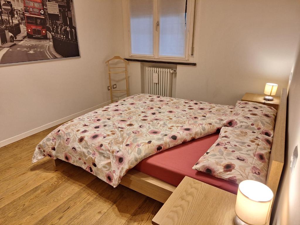 Postel nebo postele na pokoji v ubytování Appartamento Il Giardinetto Reggio Emilia