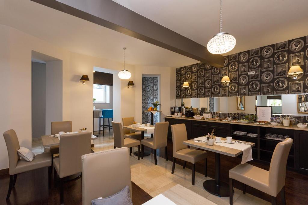 Posedenie v ubytovaní Grottger Luxury Boutique Hotel City