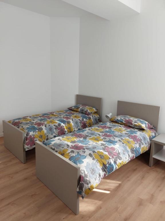 Postel nebo postele na pokoji v ubytování Casa Cilla Ettore e Anita