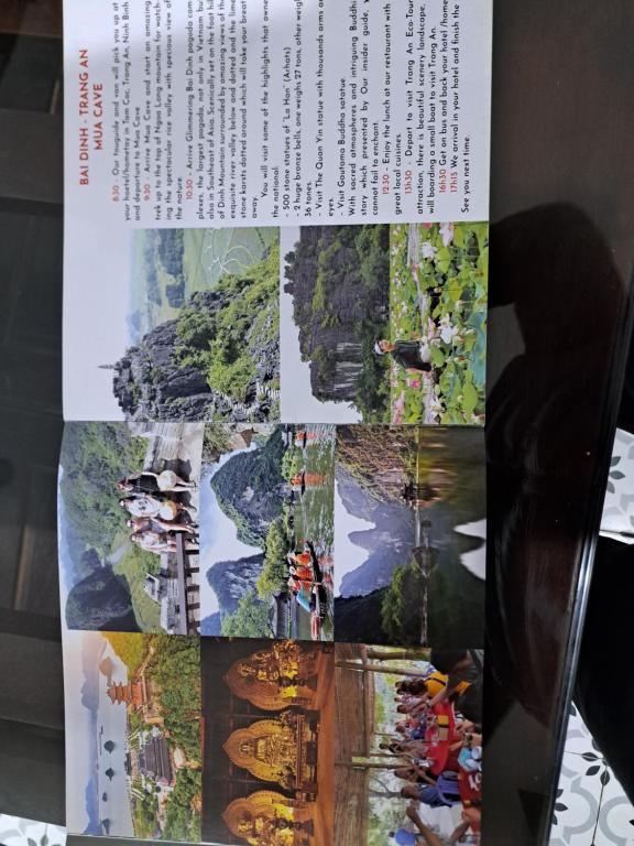 a page of a book with a picture of a river at Tam Coc Paradise Homestay in Ninh Binh