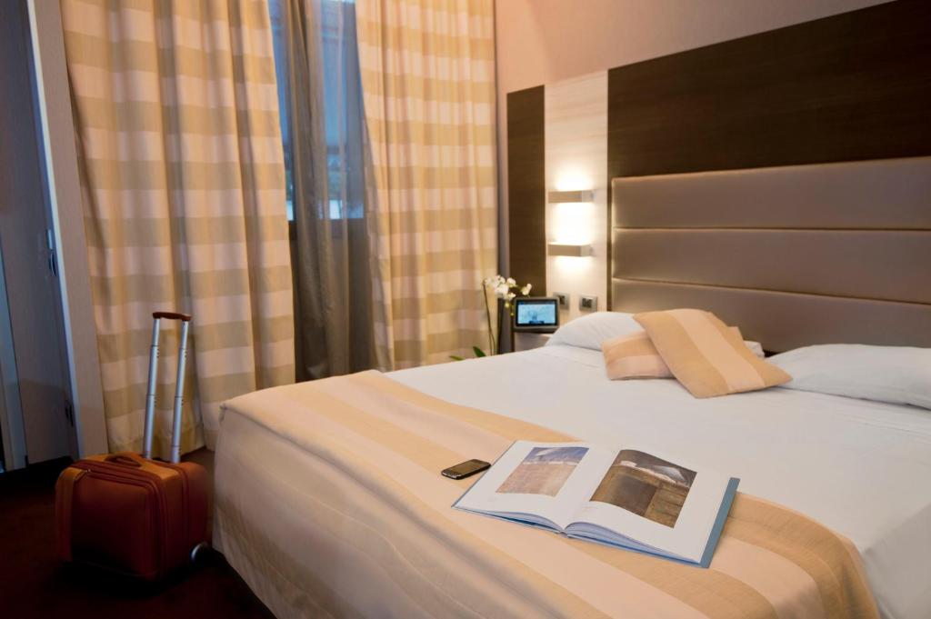 Postel nebo postele na pokoji v ubytování As Hotel Dei Giovi