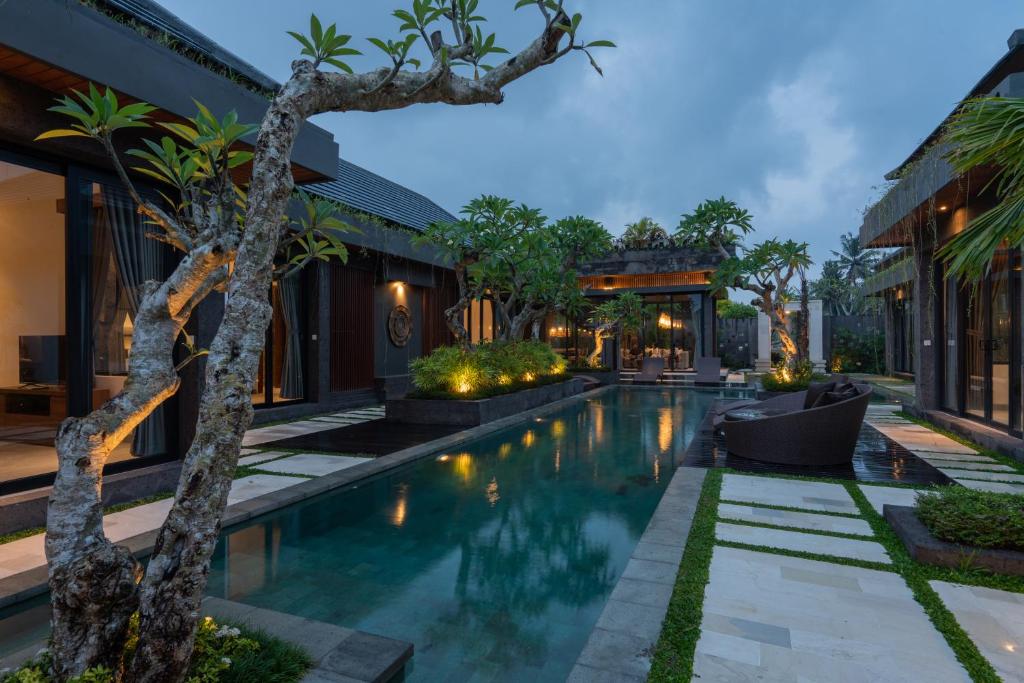 an image of a swimming pool in a villa at Villa Mama 1 Ubud in Ubud