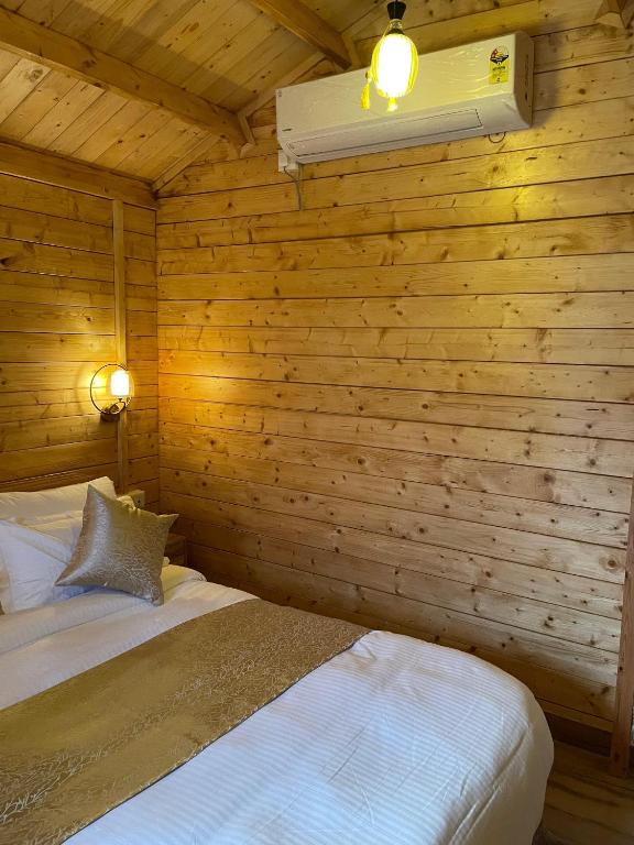 Postel nebo postele na pokoji v ubytování Mountail Eco Resort