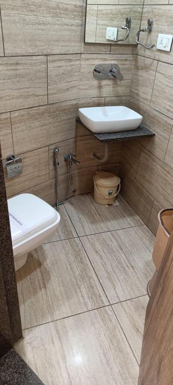Koupelna v ubytování Hotel Alka Inn