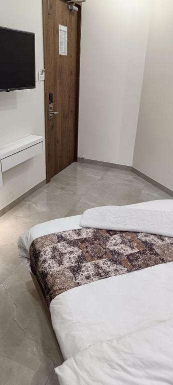 Postel nebo postele na pokoji v ubytování Hotel Alka Inn