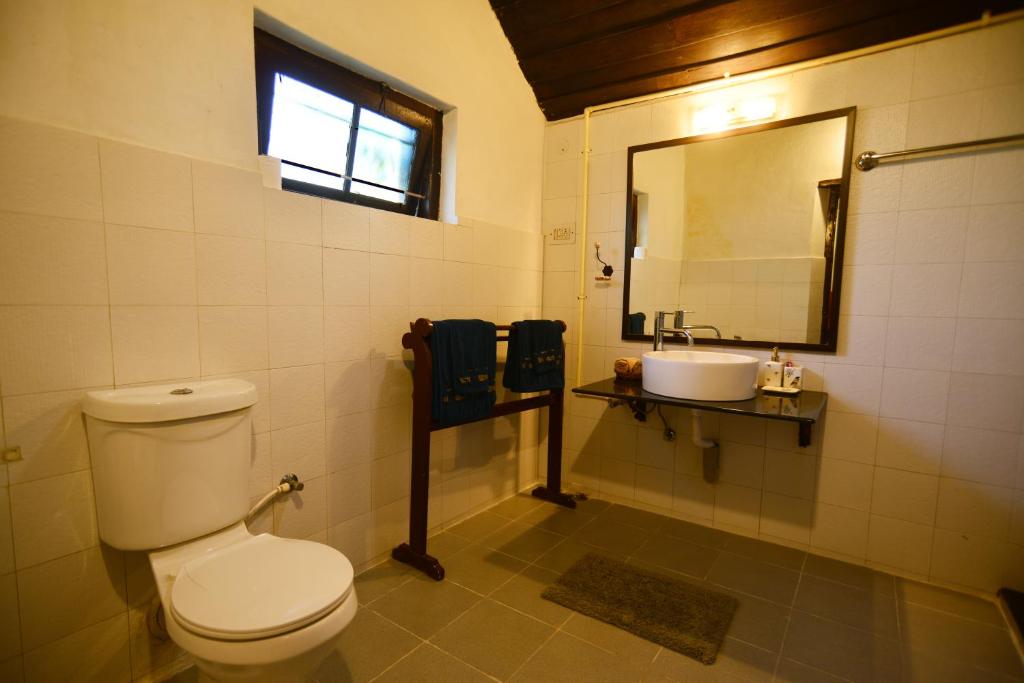 Koupelna v ubytování The Lodge, Madikeri