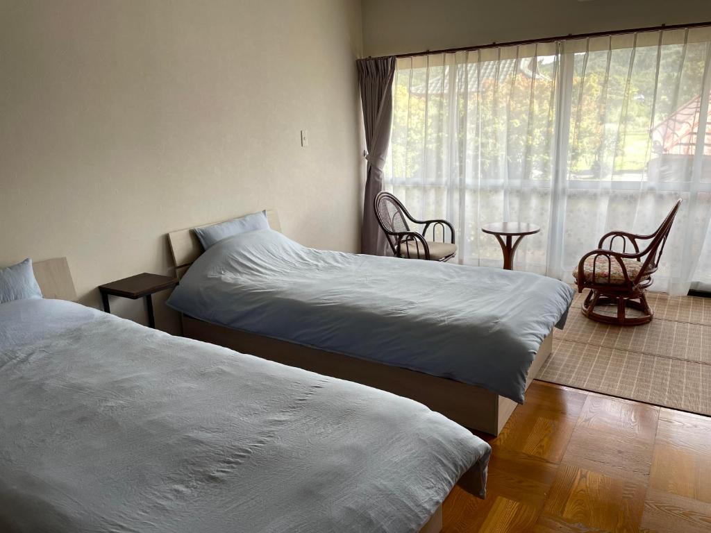 Postel nebo postele na pokoji v ubytování temple stay 玉林寺