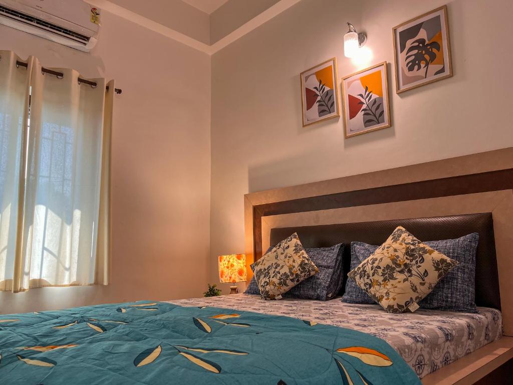 Postel nebo postele na pokoji v ubytování Arzu Homes