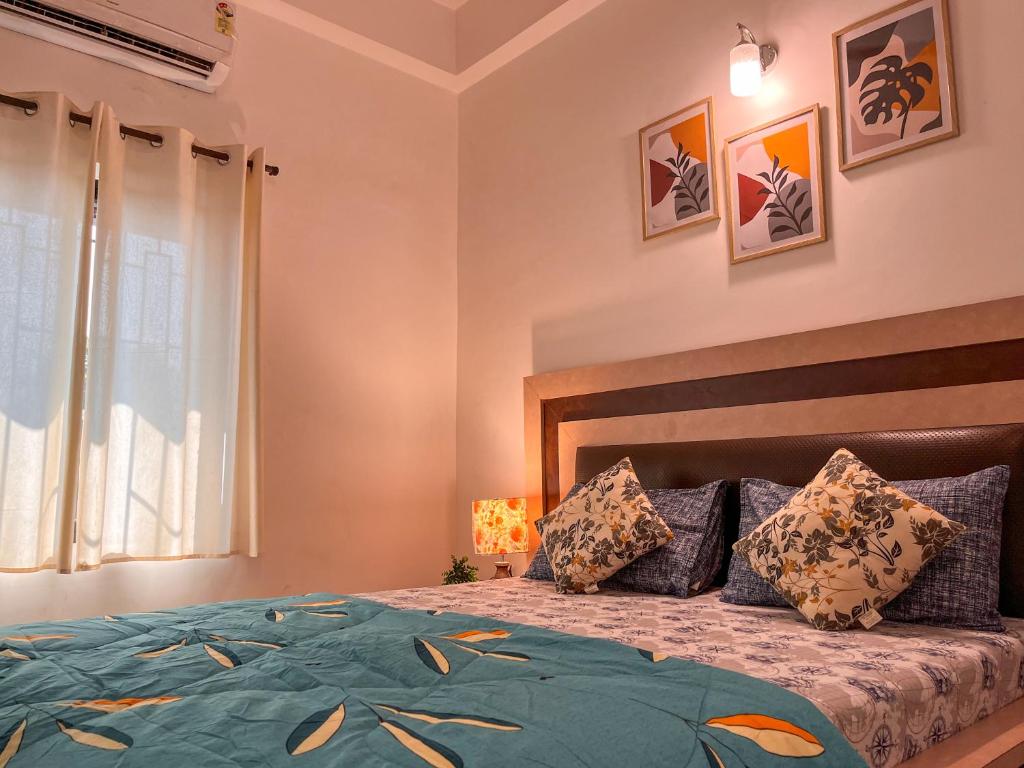 Postel nebo postele na pokoji v ubytování Arzu Homes