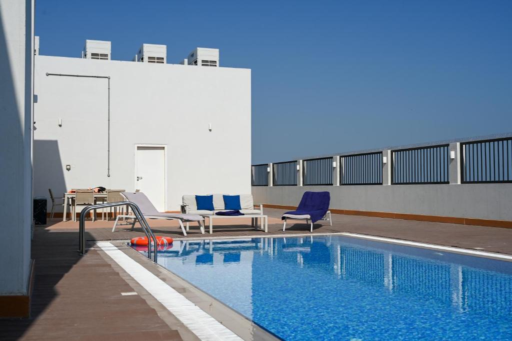Πισίνα στο ή κοντά στο Sherao Hotel Doha فندق شراعوه الدوحة
