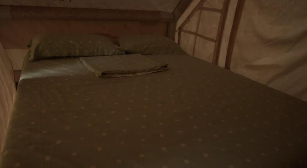 Postel nebo postele na pokoji v ubytování TK Coconut Camping