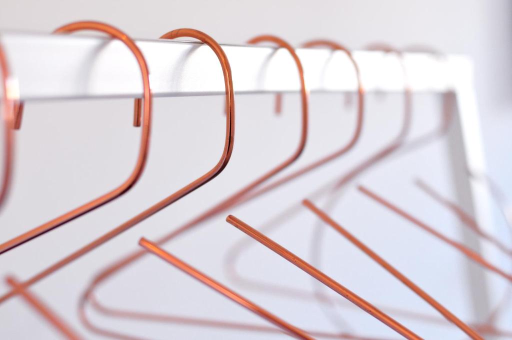 a row of glasses on a rack in a store at L'Hôtel Particulier Beziers in Béziers