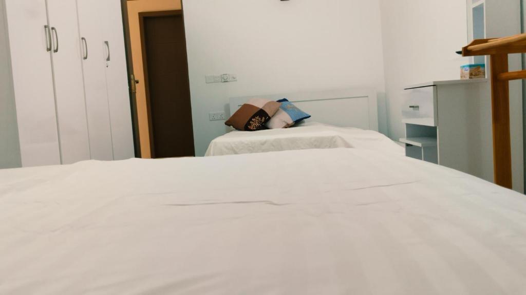 Postel nebo postele na pokoji v ubytování Kadufenna Stay