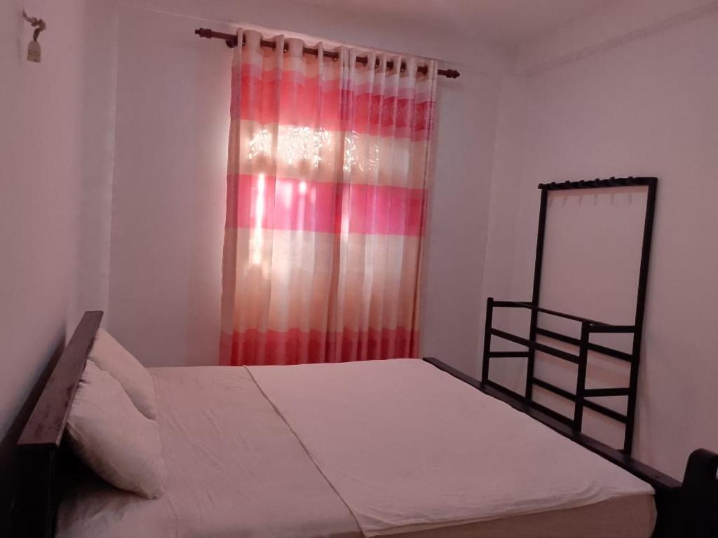 Ένα ή περισσότερα κρεβάτια σε δωμάτιο στο Randaya De Villa