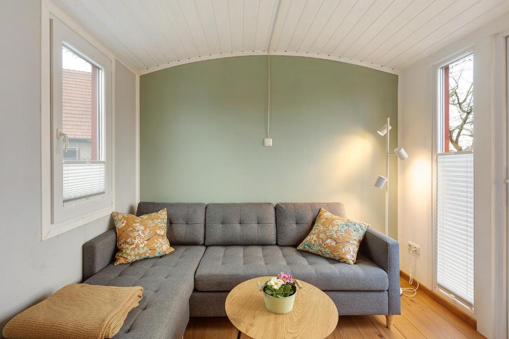 Area soggiorno di Tiny House im Grünen