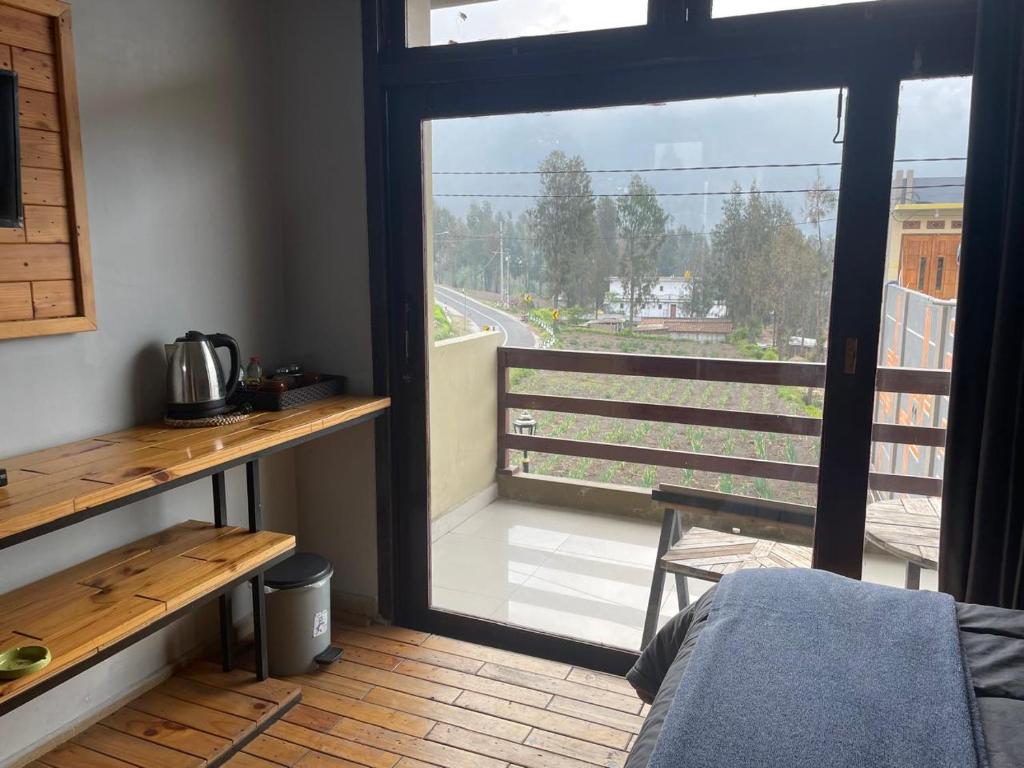 Balkón nebo terasa v ubytování Bromo Semesta Guesthouse