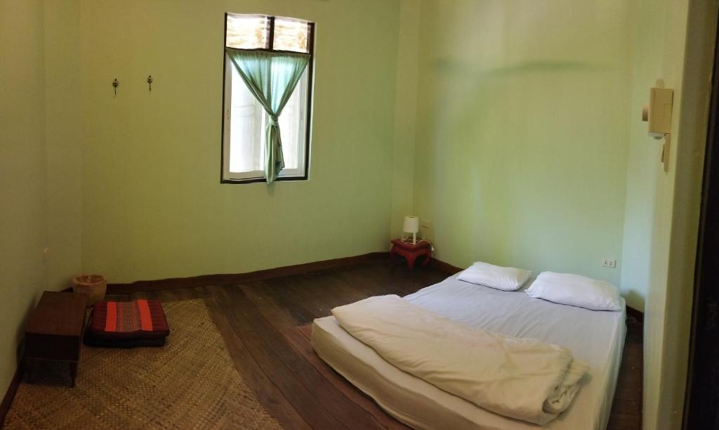 Letto o letti in una camera di Baan Bua Guest House