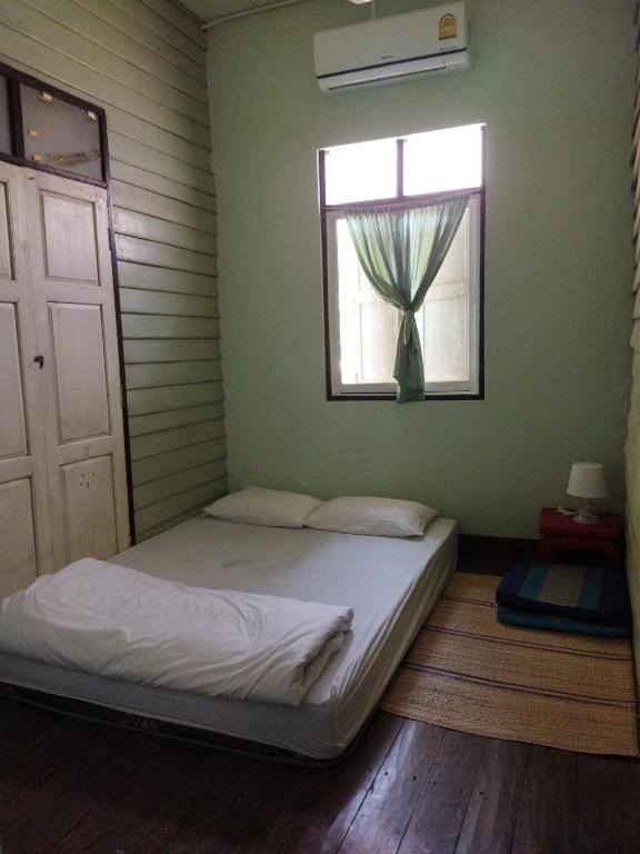 Letto o letti in una camera di Baan Bua Guest House