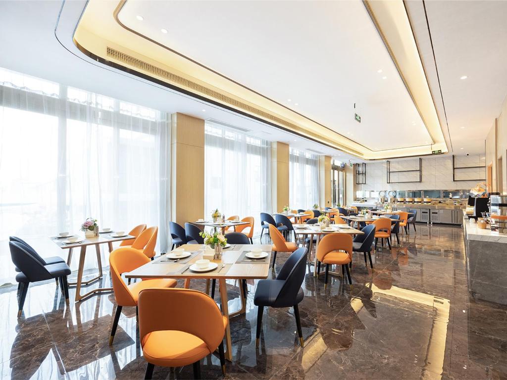 Restaurace v ubytování Country Inn & Suites by Radisson Shenzhen International Convention and Exhibition Center