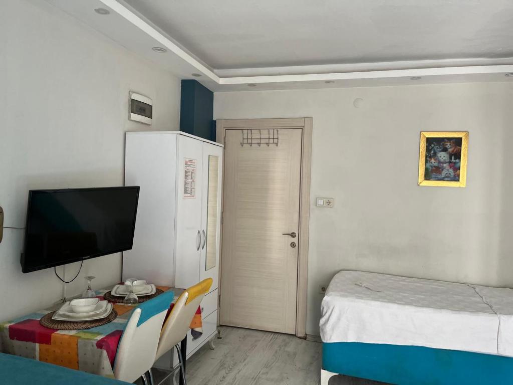 Postel nebo postele na pokoji v ubytování Şirinyer Elit Residance Apart Hotel