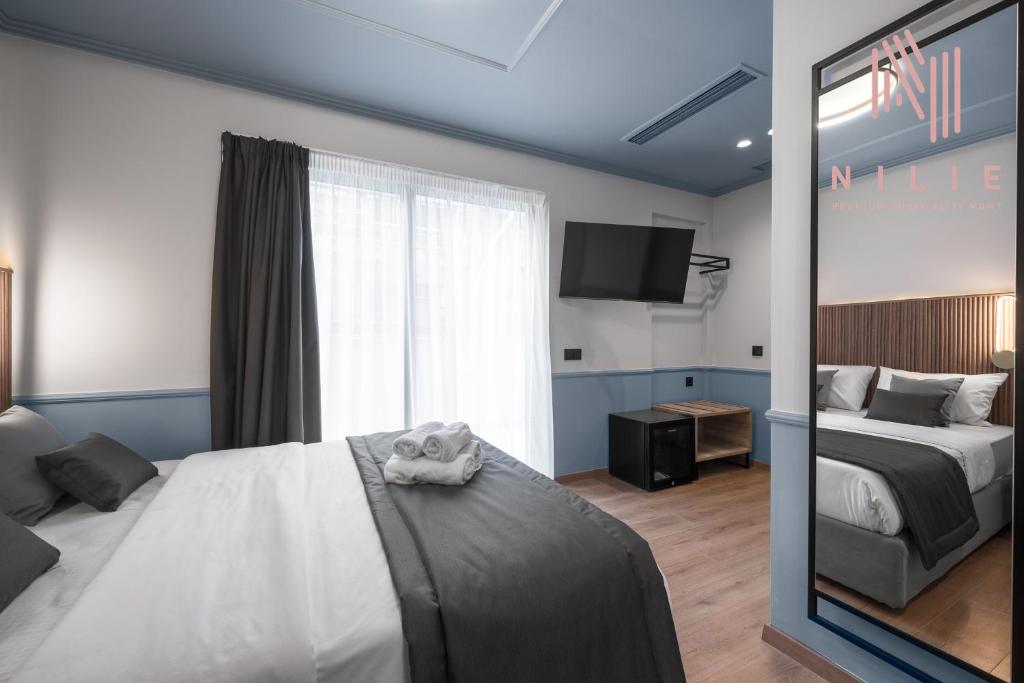 Esther Suites, Nilie Hospitality MGMT - Resim 34