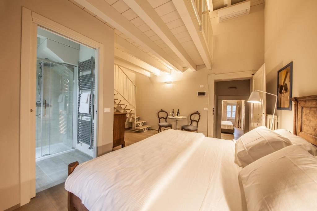 Posteľ alebo postele v izbe v ubytovaní B&B Antico Brolo