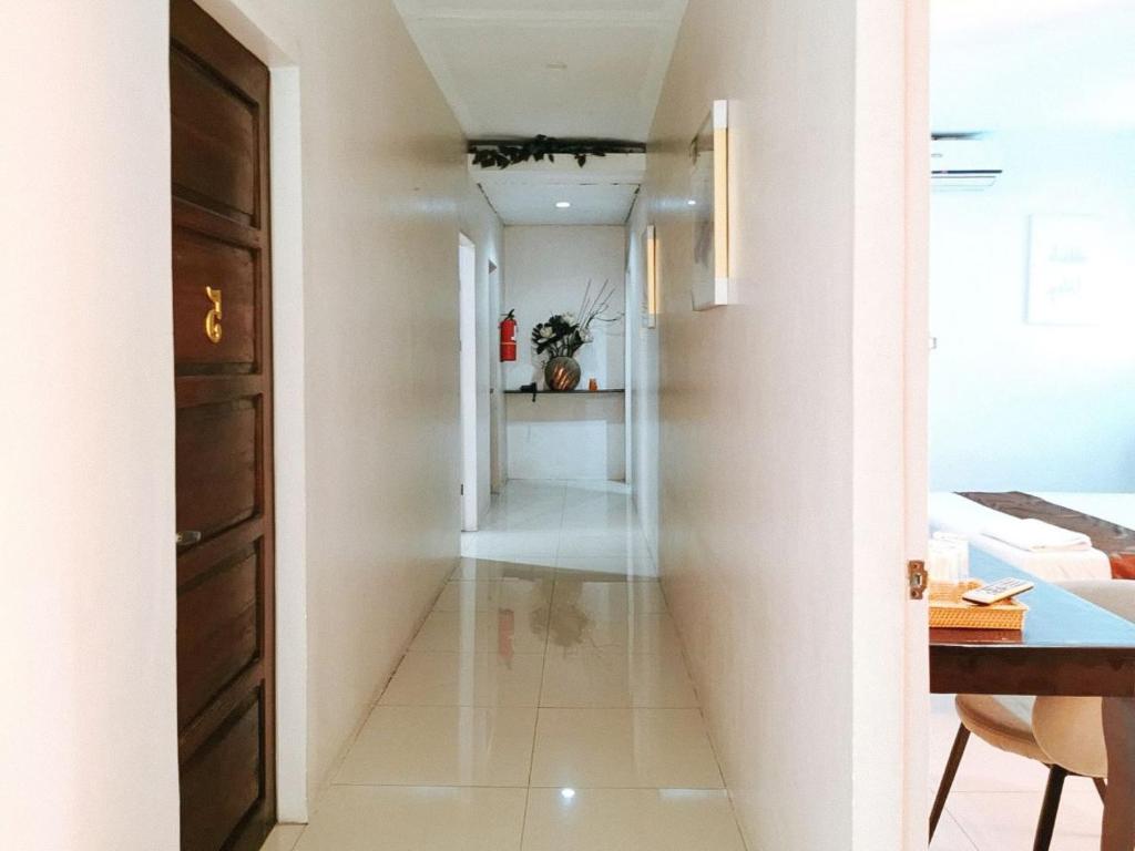 Fotografie z fotogalerie ubytování RedDoorz Segra Square Pension House v destinaci Balamban