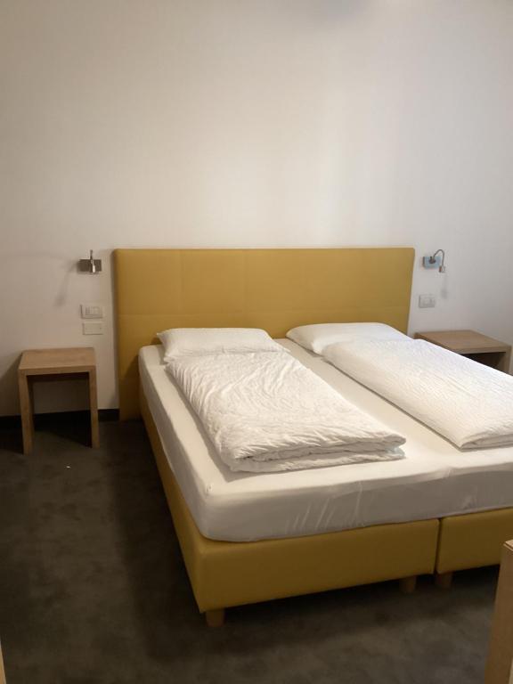 Postel nebo postele na pokoji v ubytování R&B La Calzoleria
