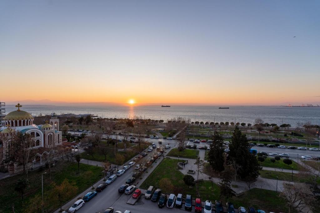 an aerial view of a city at sunset at Queen Olga Hotel in Thessaloniki