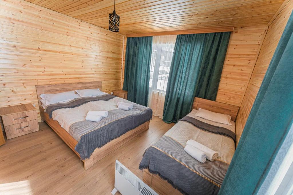 Postel nebo postele na pokoji v ubytování Mountain house in Mestia