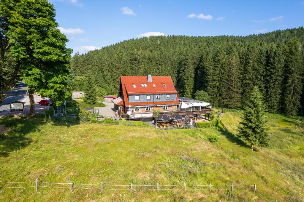 an aerial view of a large house on a hill at Appartements und Ferienhaus Gasthof Kanzlersgrund in Oberhof