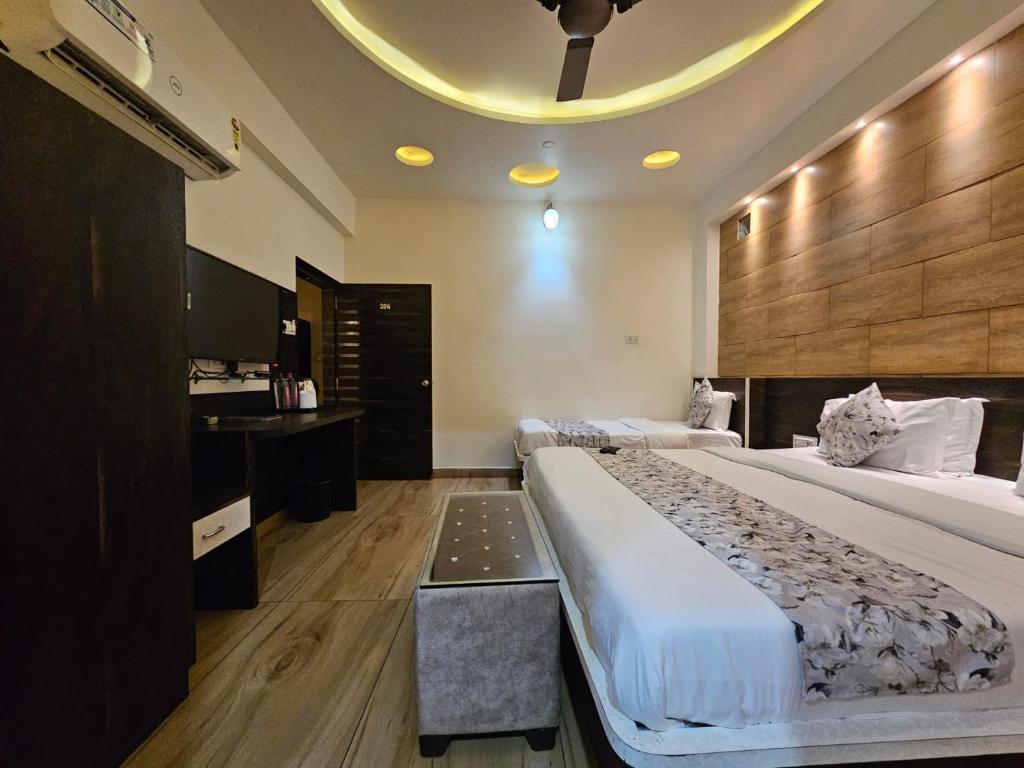 Postel nebo postele na pokoji v ubytování Hotel Leela Vilas Pushkar -A Boutique Hotel