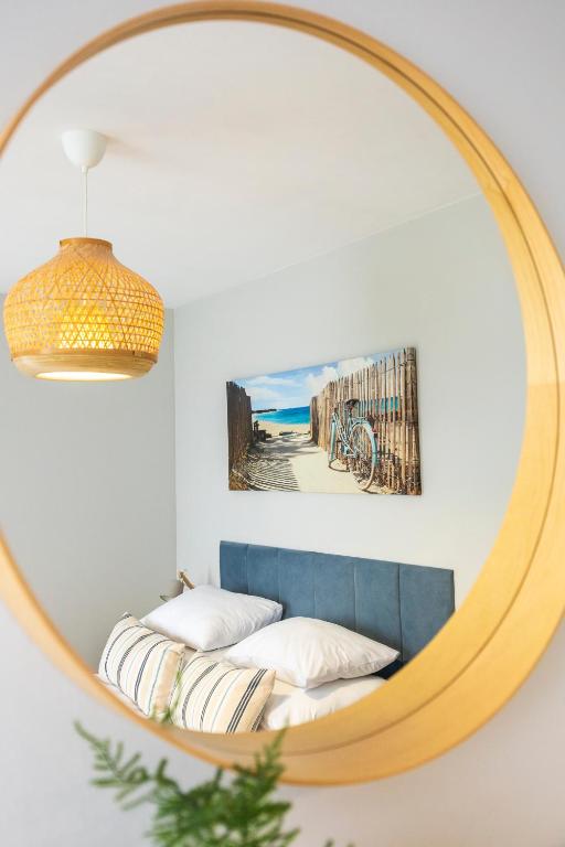 Posteľ alebo postele v izbe v ubytovaní Apartament Reymonta 15 SurfingBird Kołobrzeg