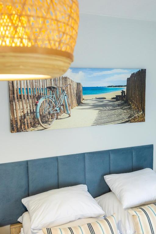 Posteľ alebo postele v izbe v ubytovaní Apartament Reymonta 15 SurfingBird Kołobrzeg