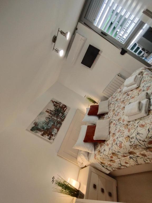 A bed or beds in a room at Armonía y Tranquilidad 3