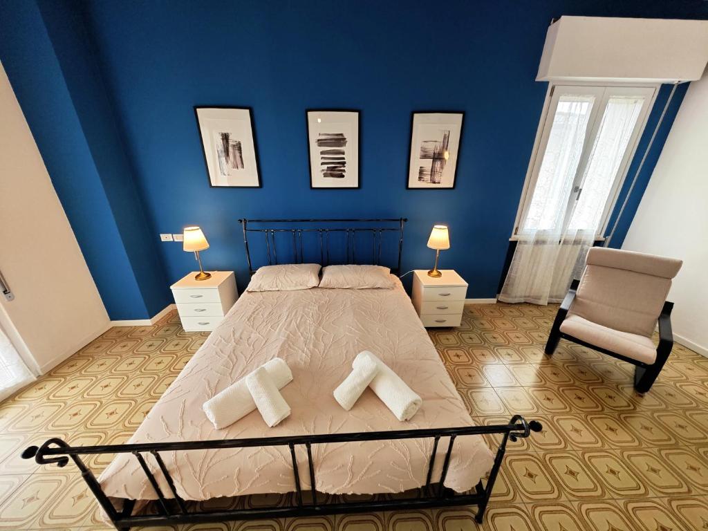 Postel nebo postele na pokoji v ubytování b&b il Melograno