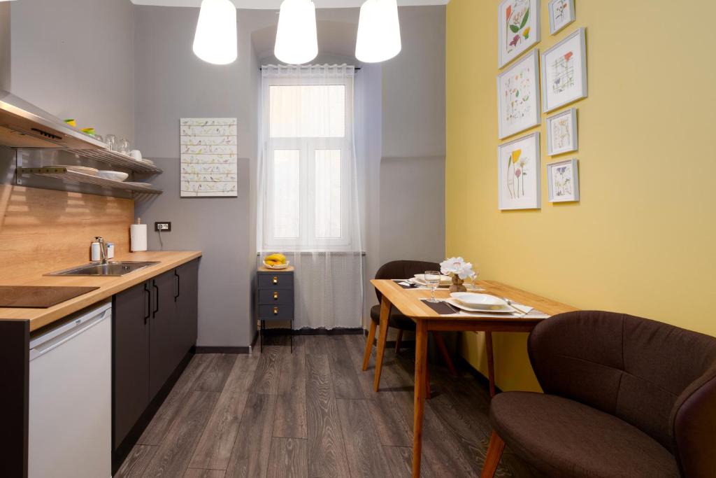 Kuchyň nebo kuchyňský kout v ubytování Apartment Korzo Filodrammatica