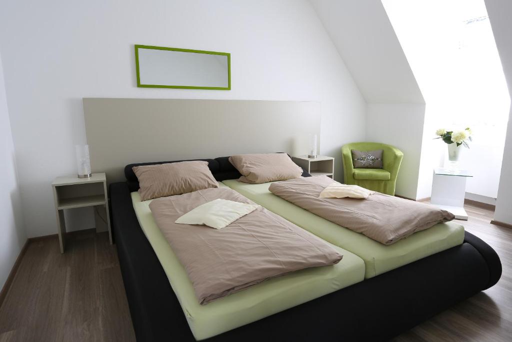 Postel nebo postele na pokoji v ubytování Hotel Landgasthof zum Kaffelstein