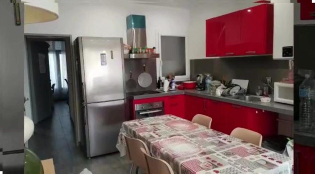 Kuchyň nebo kuchyňský kout v ubytování Hostel-Élisée-Perpignan