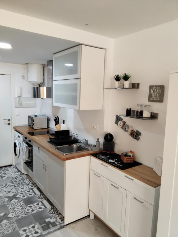 Kuchyňa alebo kuchynka v ubytovaní LOFT en playa paraíso