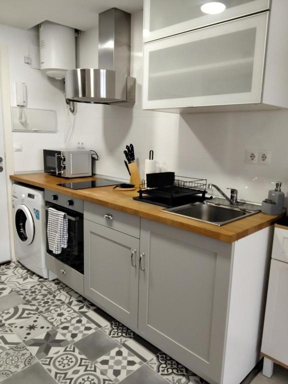 Kuchyňa alebo kuchynka v ubytovaní LOFT en playa paraíso
