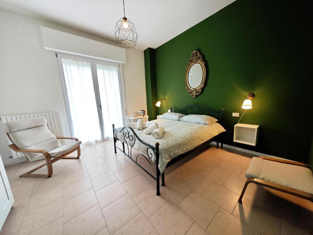 Postel nebo postele na pokoji v ubytování b&b il Melograno