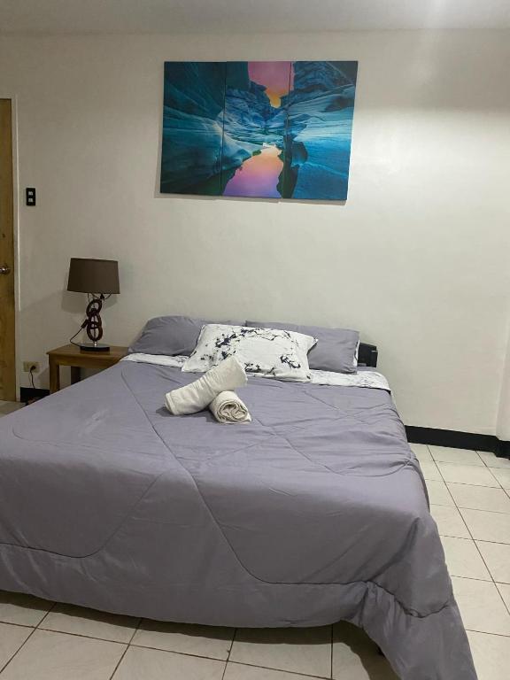 Postel nebo postele na pokoji v ubytování Andresas Homestay