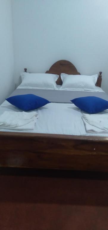 Postel nebo postele na pokoji v ubytování Kulassa Homes