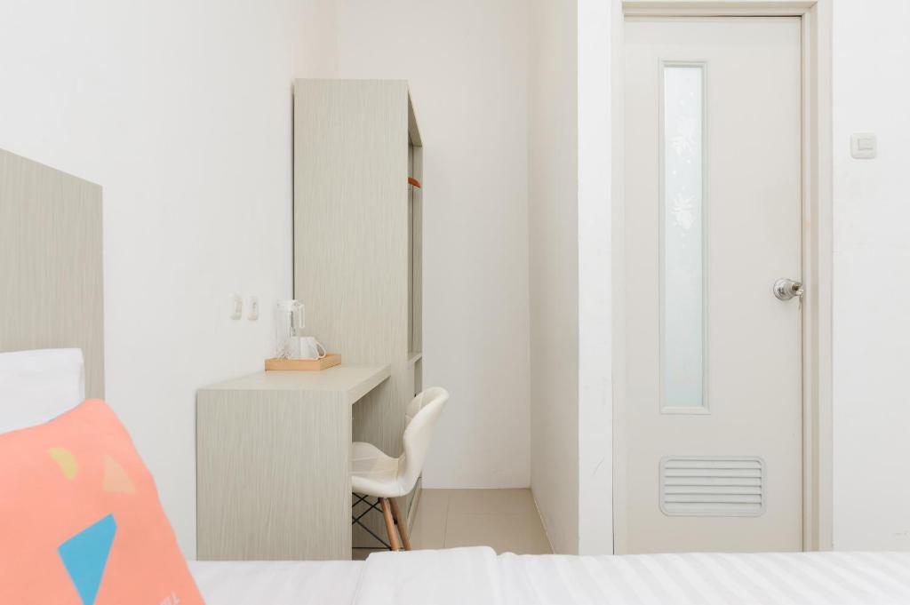 Koupelna v ubytování Sans Hotel La Vida Malang