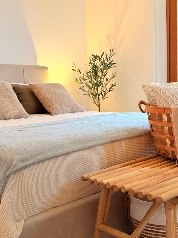 Ένα ή περισσότερα κρεβάτια σε δωμάτιο στο Epidavros View Villas