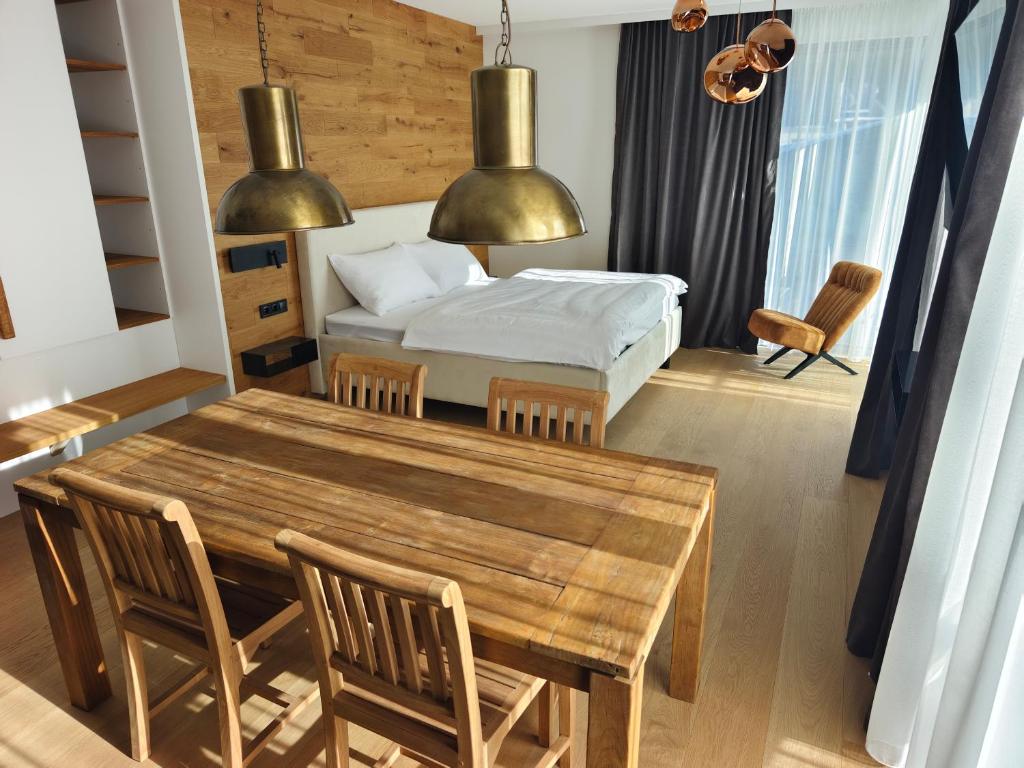 Ένα ή περισσότερα κρεβάτια σε δωμάτιο στο ELSA Spa Apartments Tux